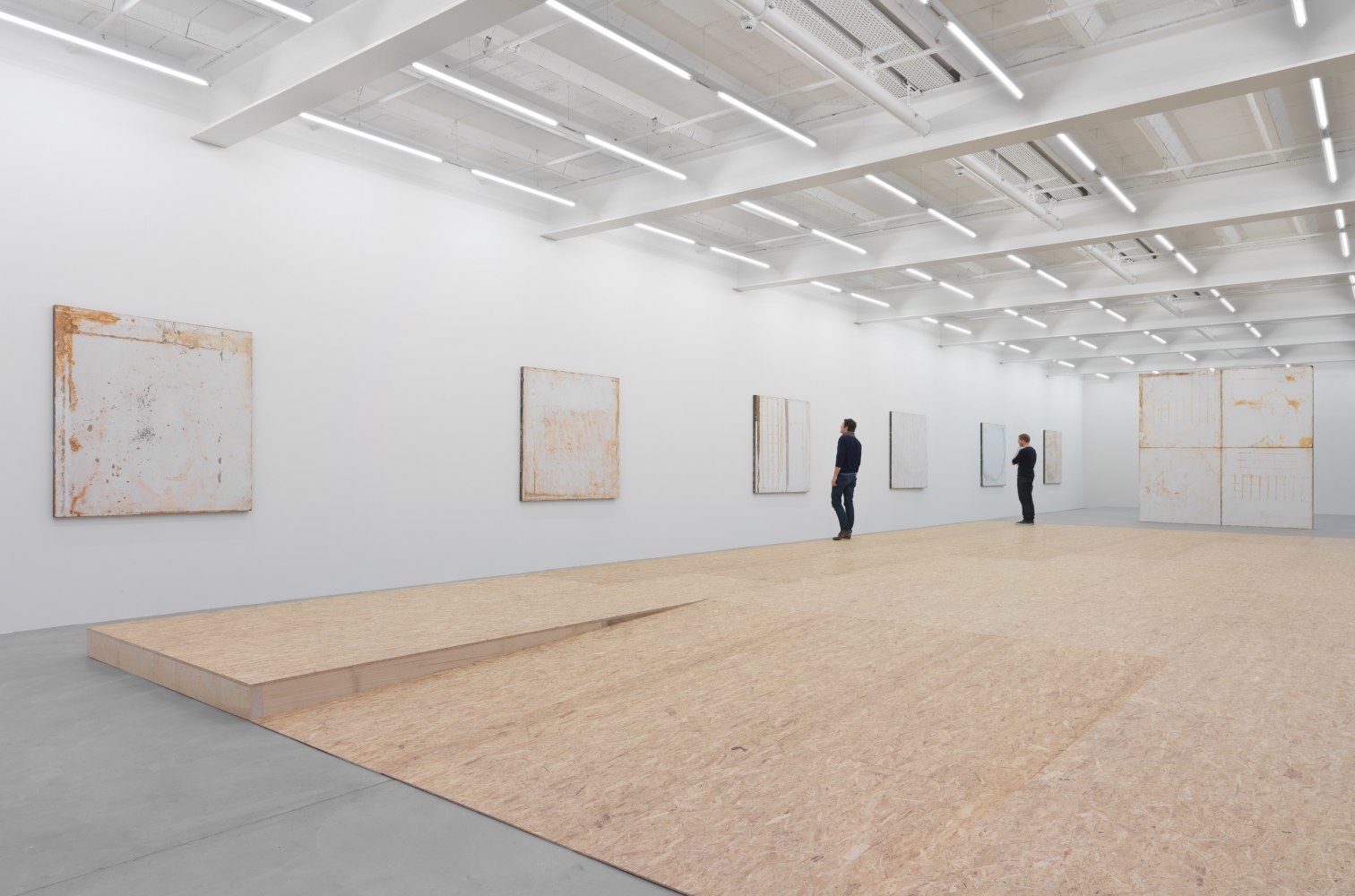 Installation view of Oscar Tuazon sculptures and floor installation exhibition