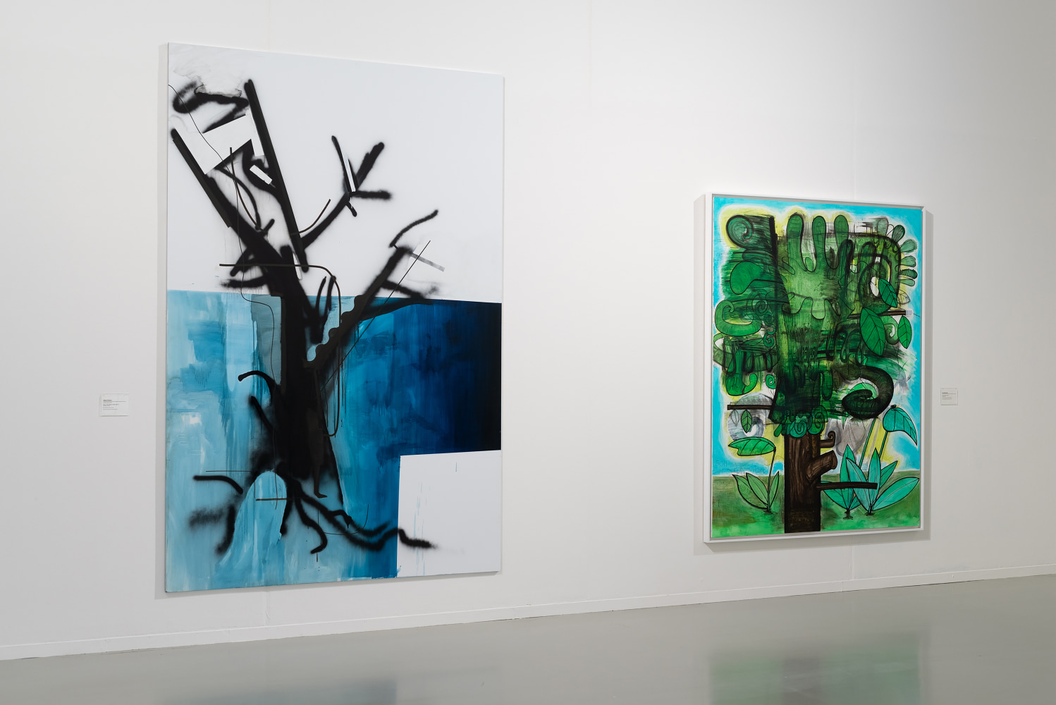 Installation view of paintings by Albert Oehlen and Carroll Dunham