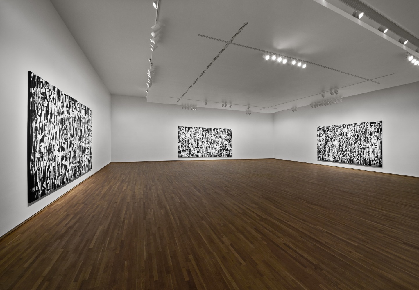 Installation view of black and white paintings by Adam Pendleton
