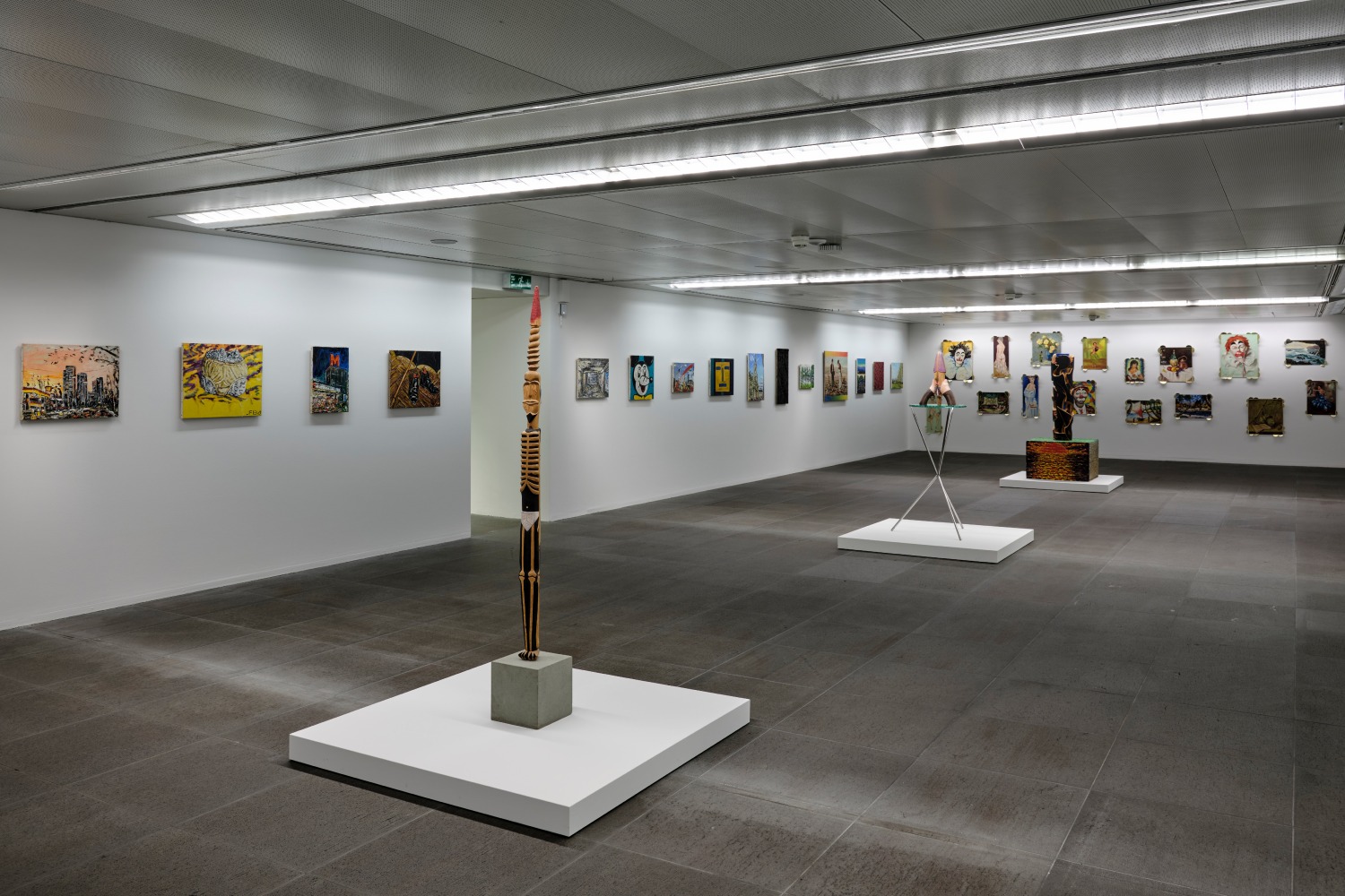 Installation view of paintings and sculptures by Jean-Frédéric Schnyder