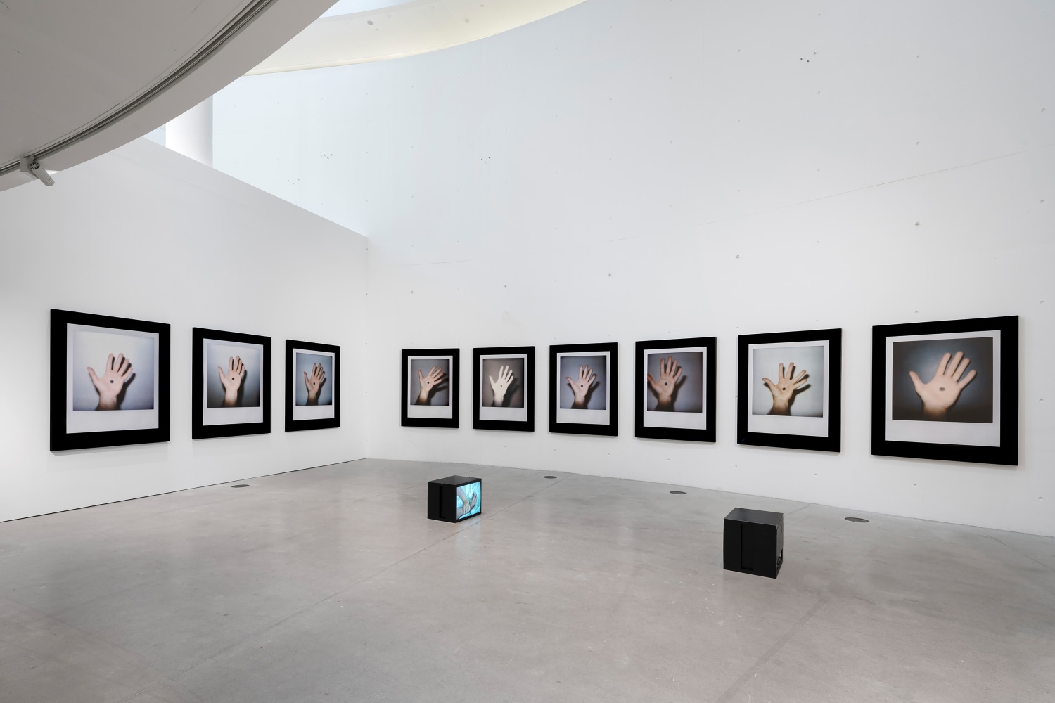 Installation view of photographs by Douglas Gordon