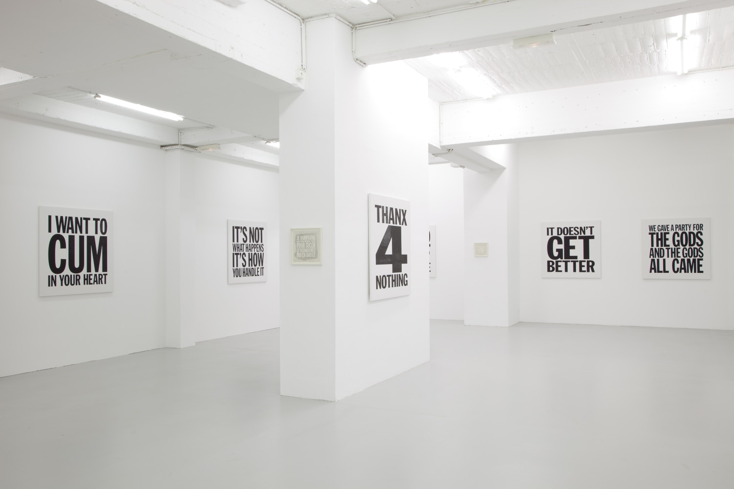 Installation view of wall works by John Giorno