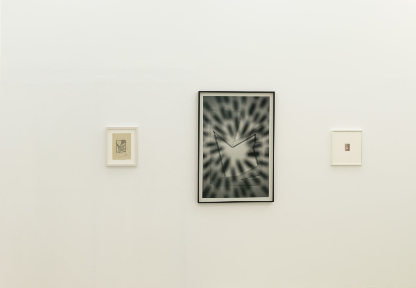 Installation view of Wyatt Kahn wall reliefs, photographs, works on paper