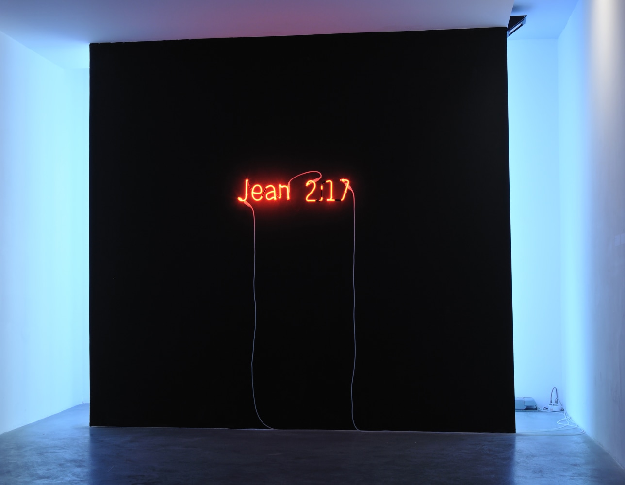 Installation view of neon sign by Douglas Gordon