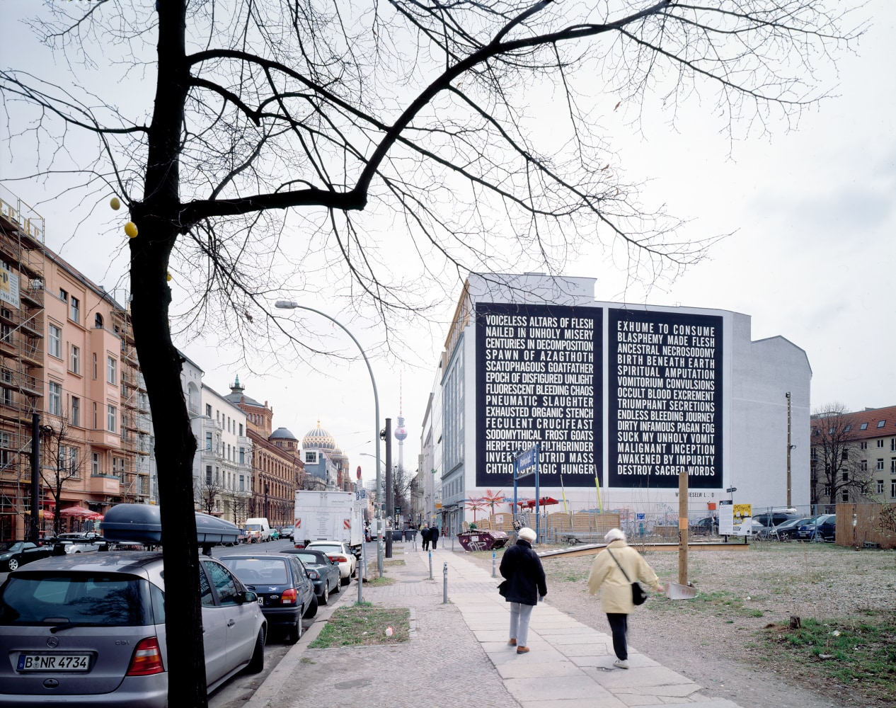 Installation view of outside wall work by Steven Shearer
