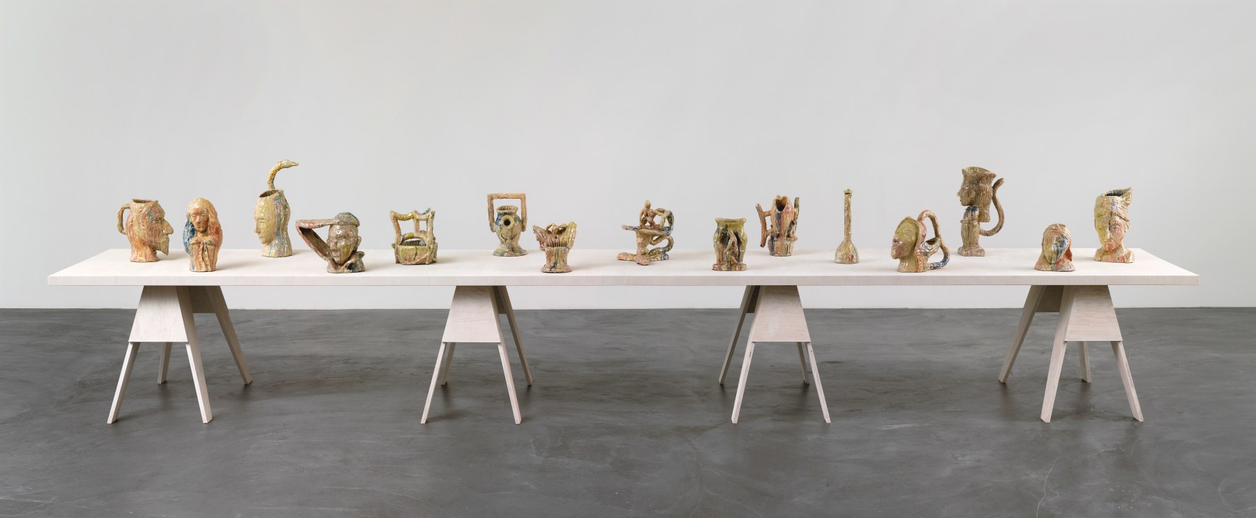Group of sculptures by Andrew Lord on table