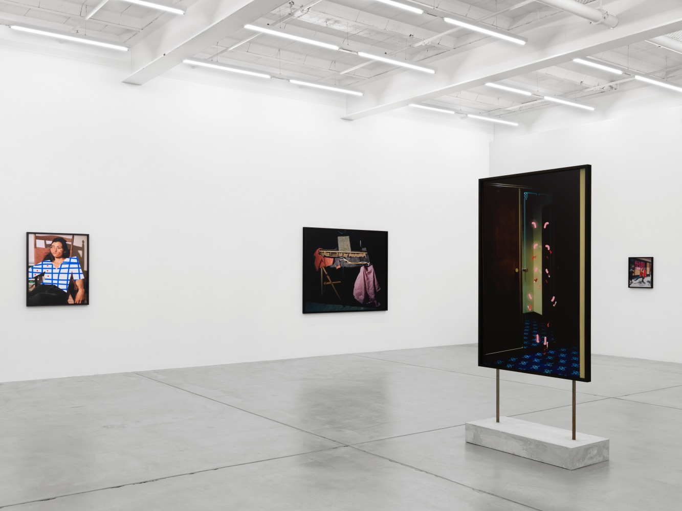 Installation view of Lucas Blalock photography and sculpture exhibition