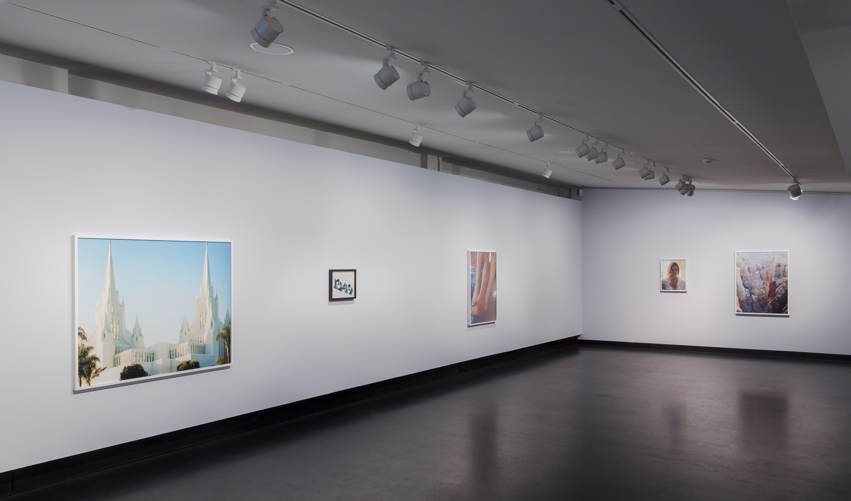 Installation view of photographs by Torbjørn Rødland