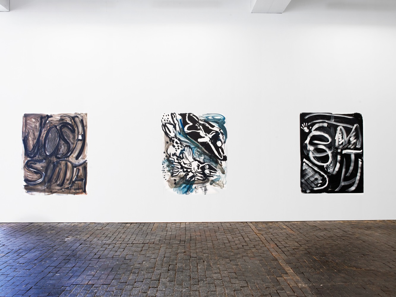 Installation view of paintings by Josh Smith