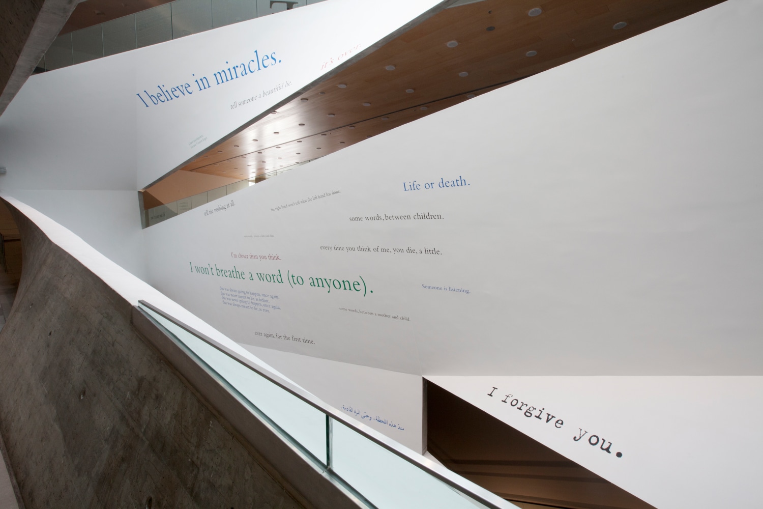 Installation view of wall quotes by Douglas Gordon