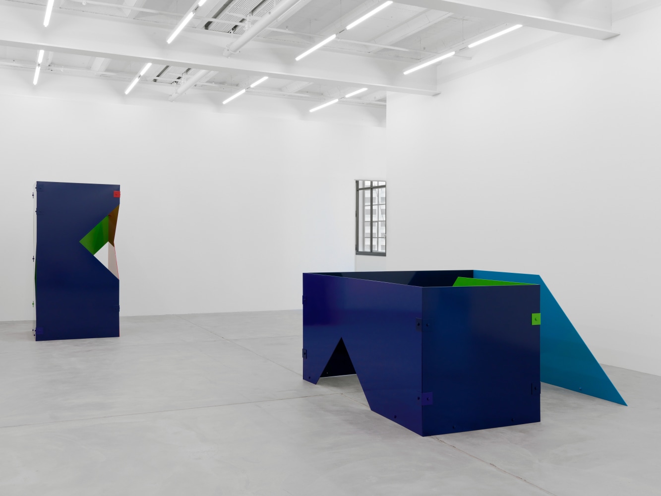 Installation view of Sam Falls paintings and sculptures exhibition