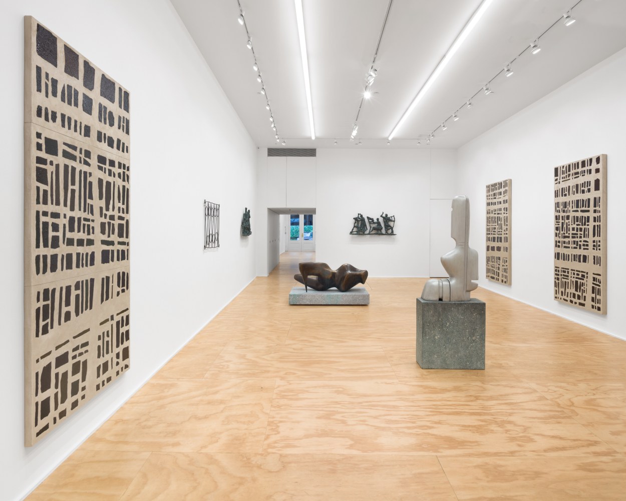 Installation view of sculptures and wall works by Valentin Carron