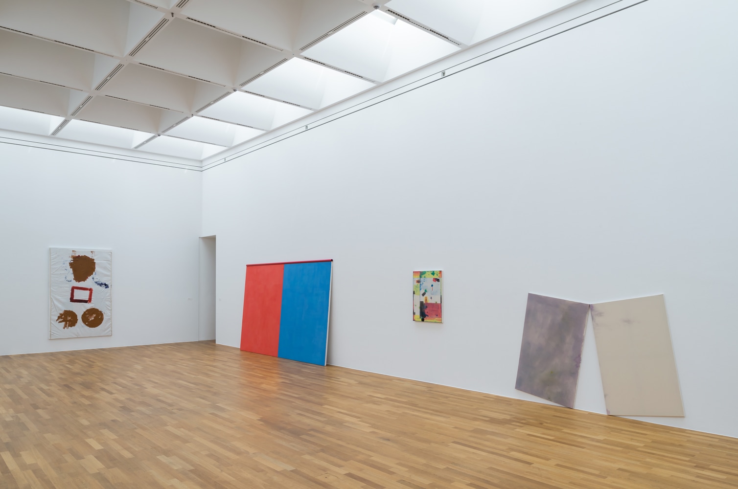Installation view of paintings by Joe Bradley