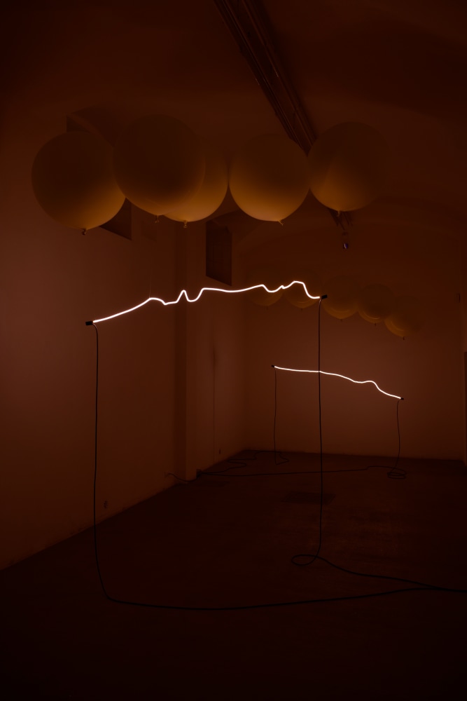 Installation view of sculptures and paintings by Sam Falls