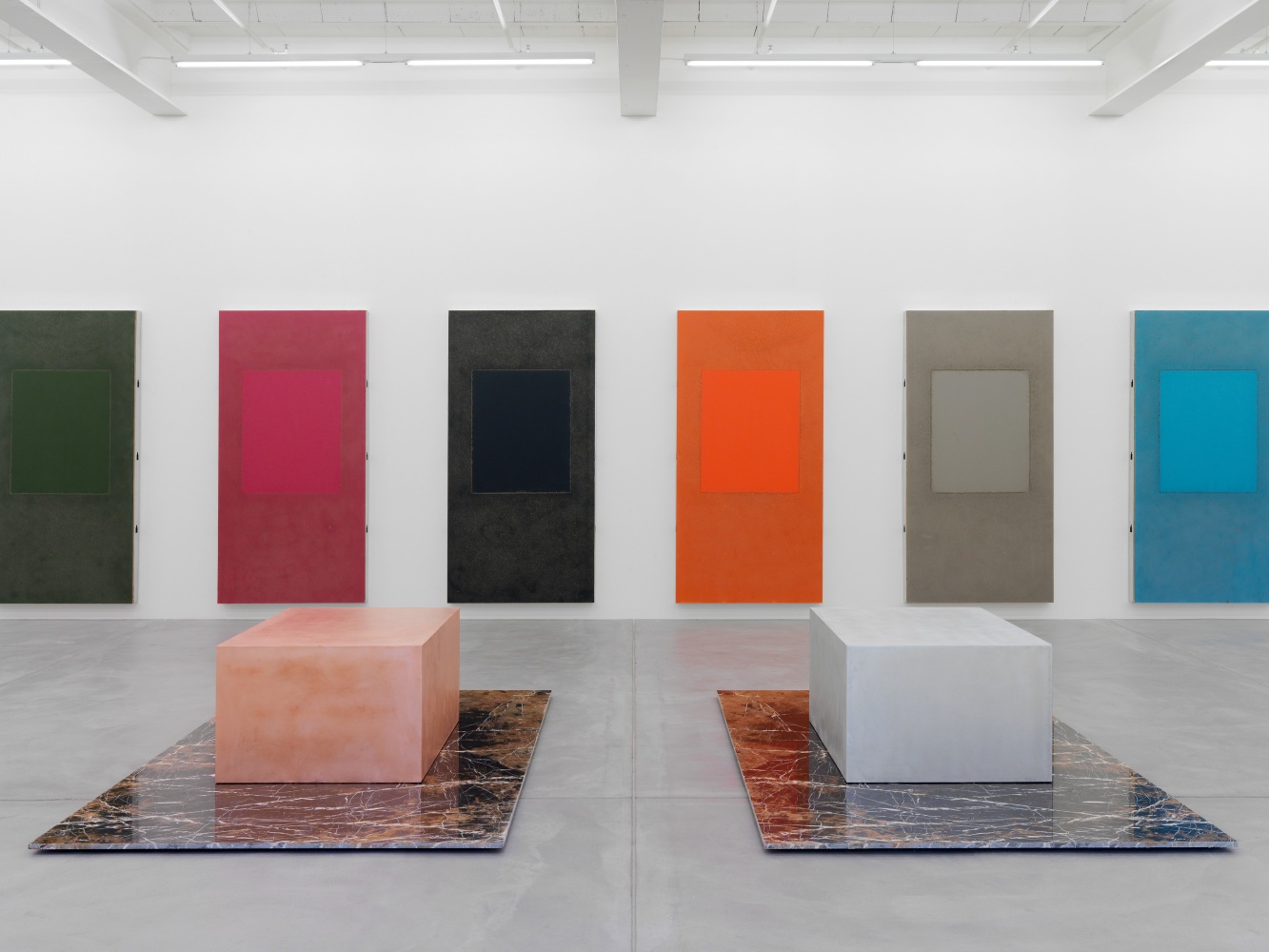 Installation view of Sam Falls paintings and sculptures exhibition