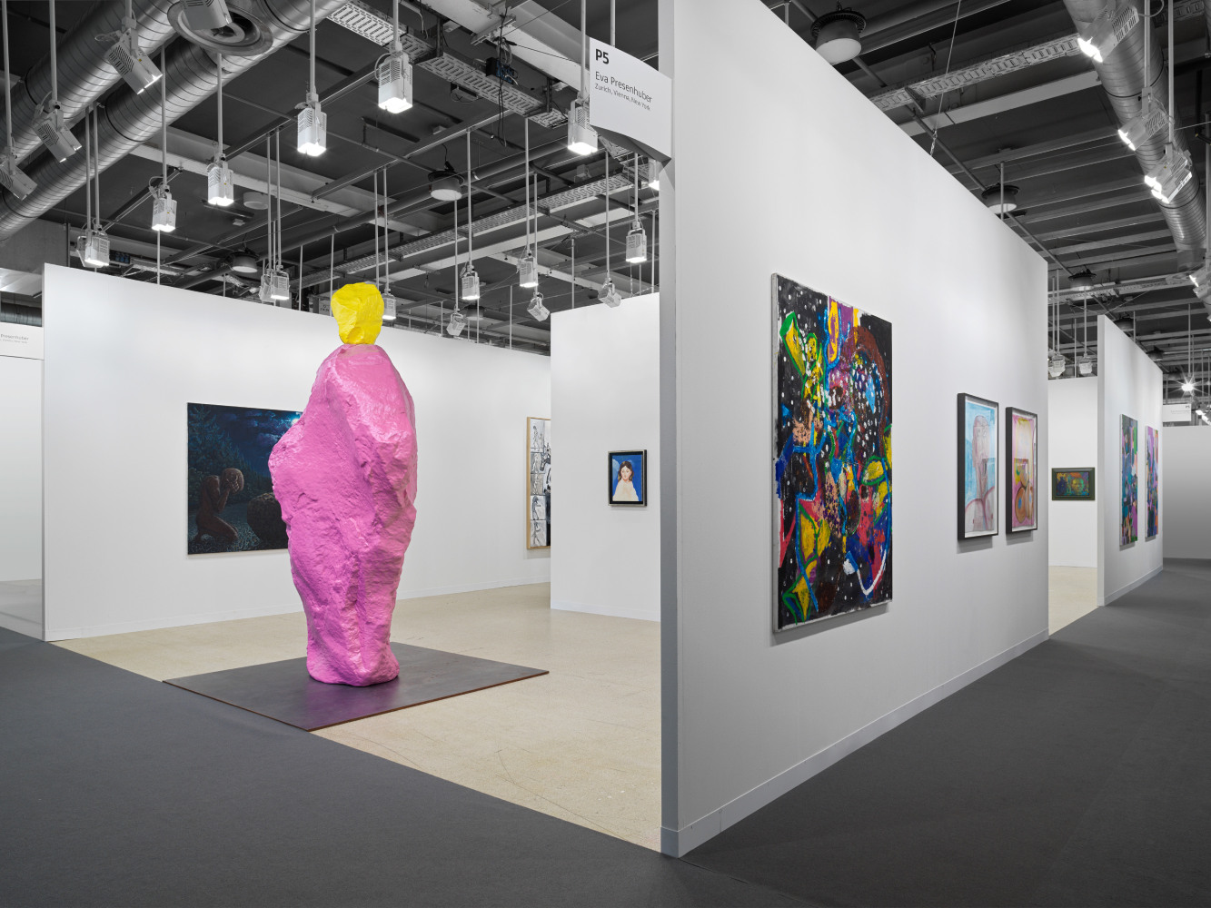 installation view of works by various artists at the Art Basel booth