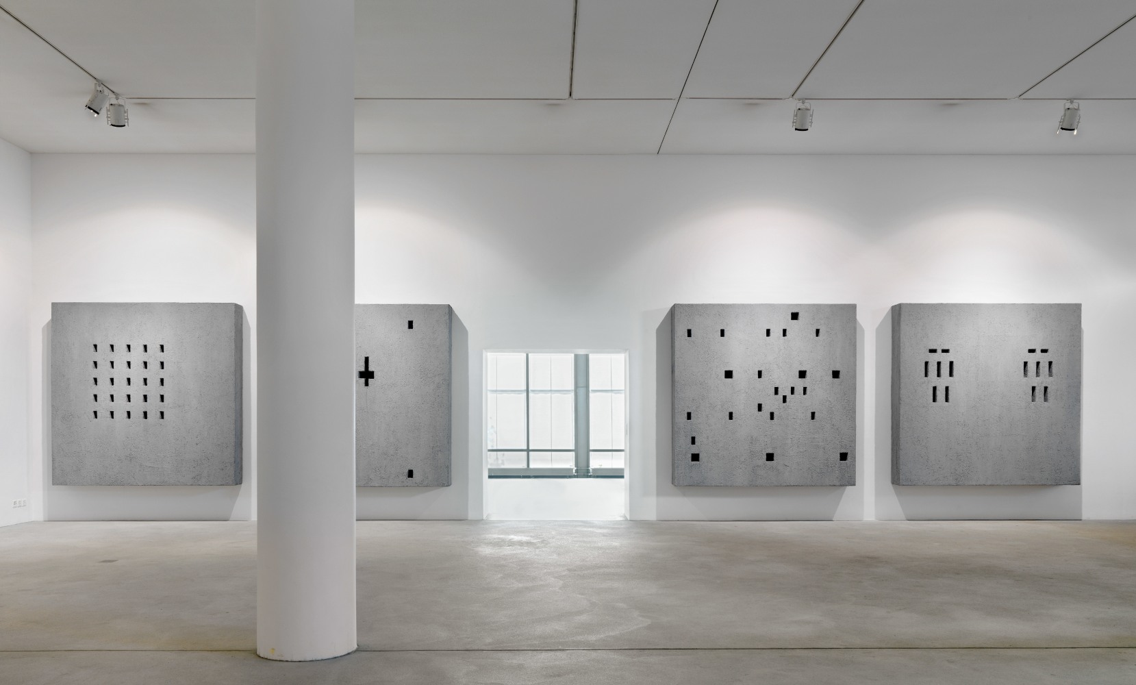 Installation view of wall works by Valentin Carron