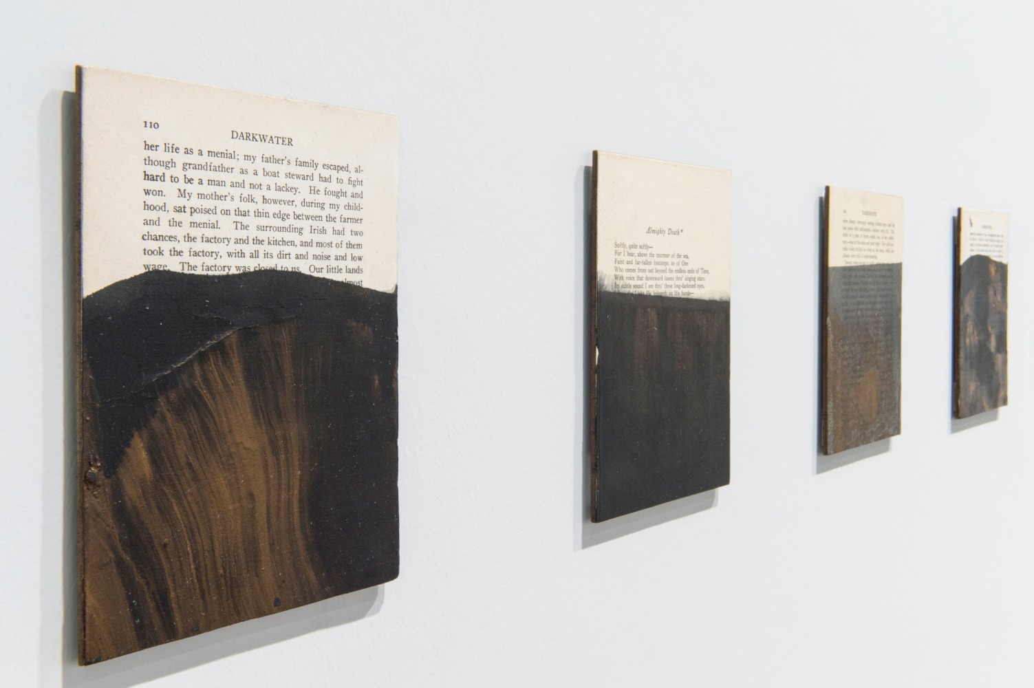 Installation view of paintings by Tim Rollins and K.O.S.