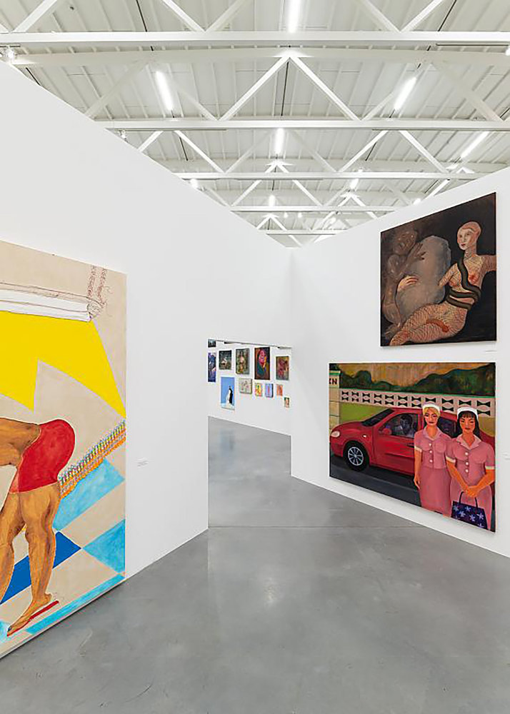 Installation view of painting by Tschabalala Self and paintings of other artists