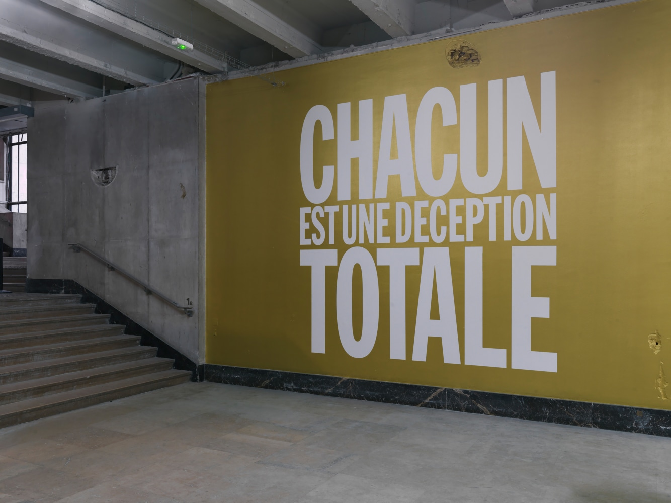 Installation view of wall work by John Giorno