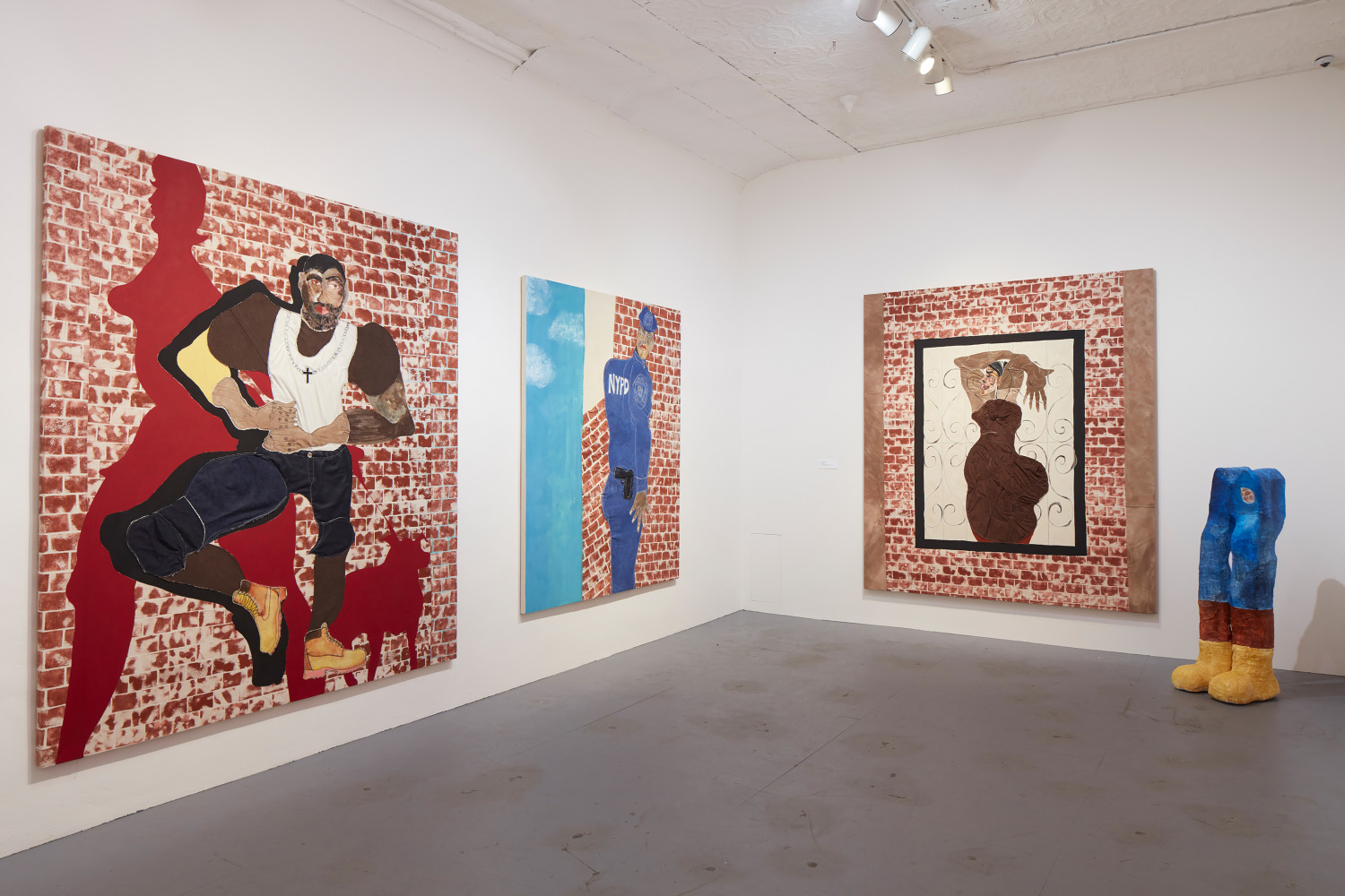 Installation view of paintings and sculptures by Tschabalala Self