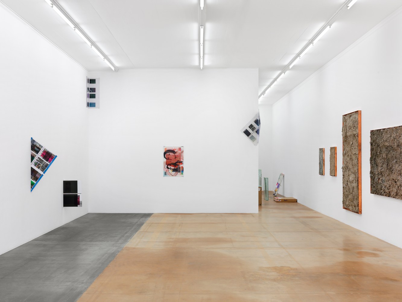 Installation view of wall works by Walead Beshty