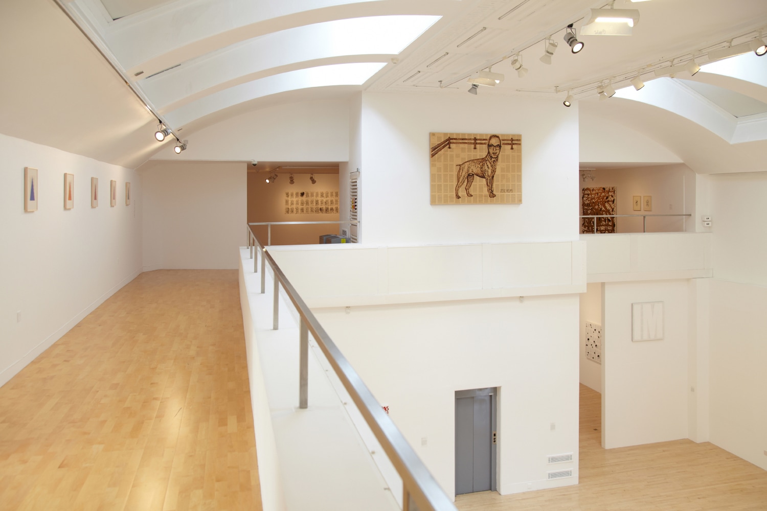 Installation view of works by Tim Rollins and K.O.S.