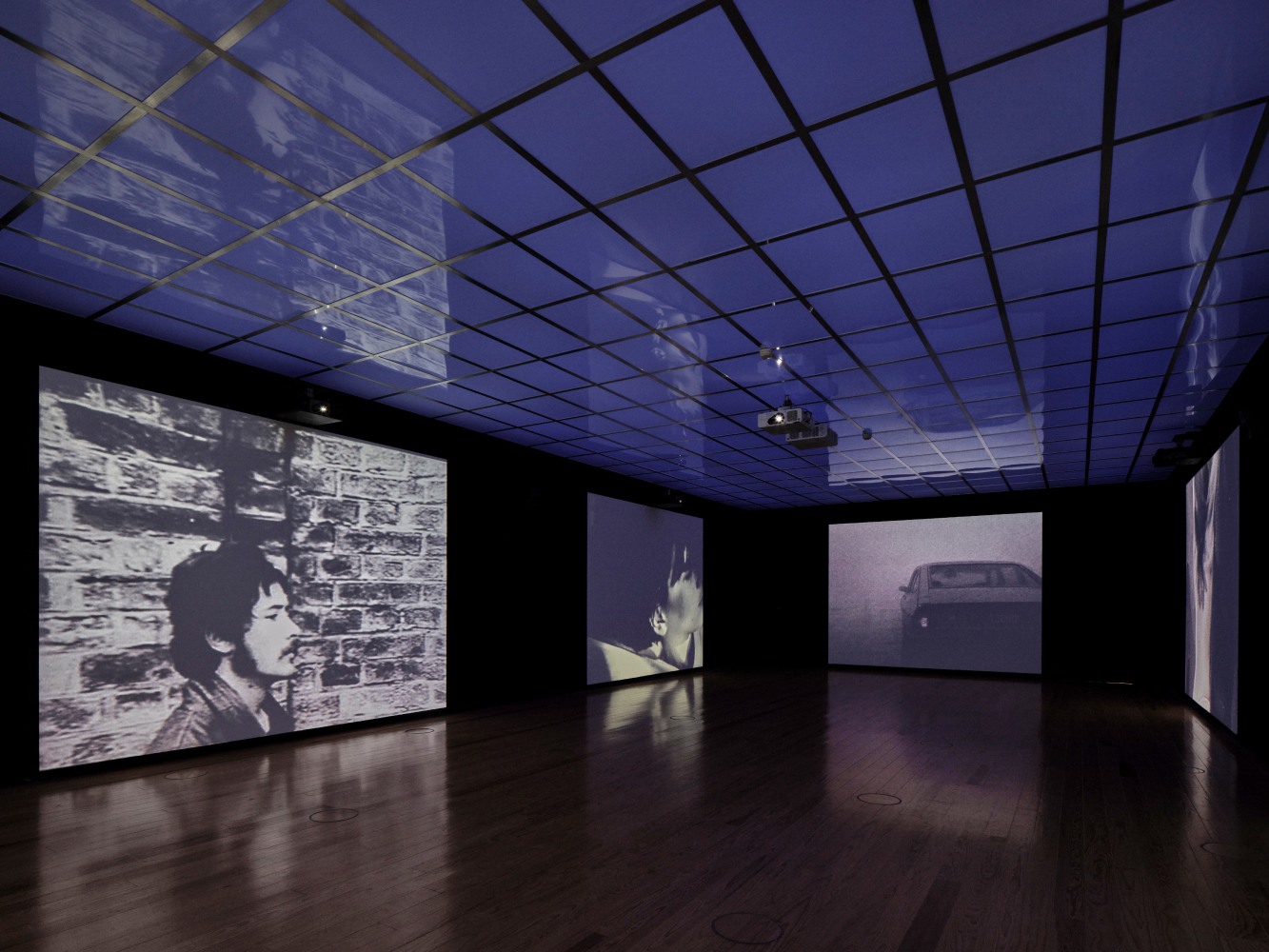 Installation view of paintings and sculptures by Ugo Rondinone