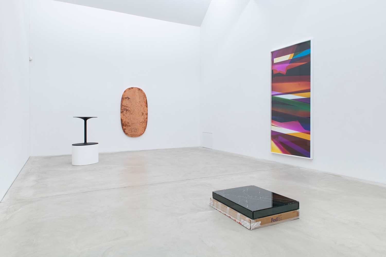 Installation view of sculptures and wall works by Walead Beshty