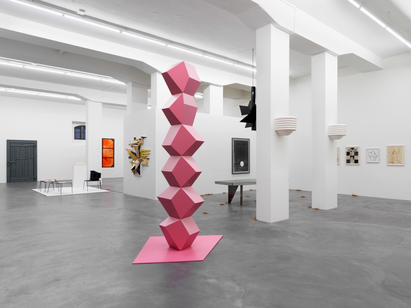 Installation view of paintings and sculptures group exhibition