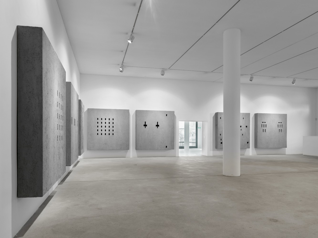 Installation view of wall works by Valentin Carron