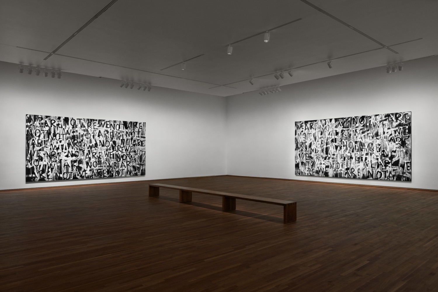 Installation view of black and white paintings by Adam Pendleton