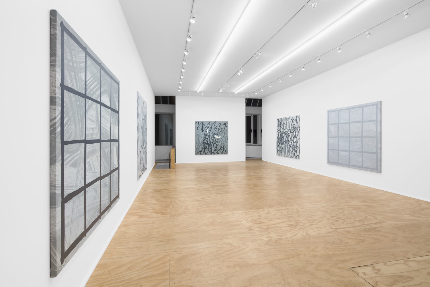 Installation view of paintings by Amy Feldman