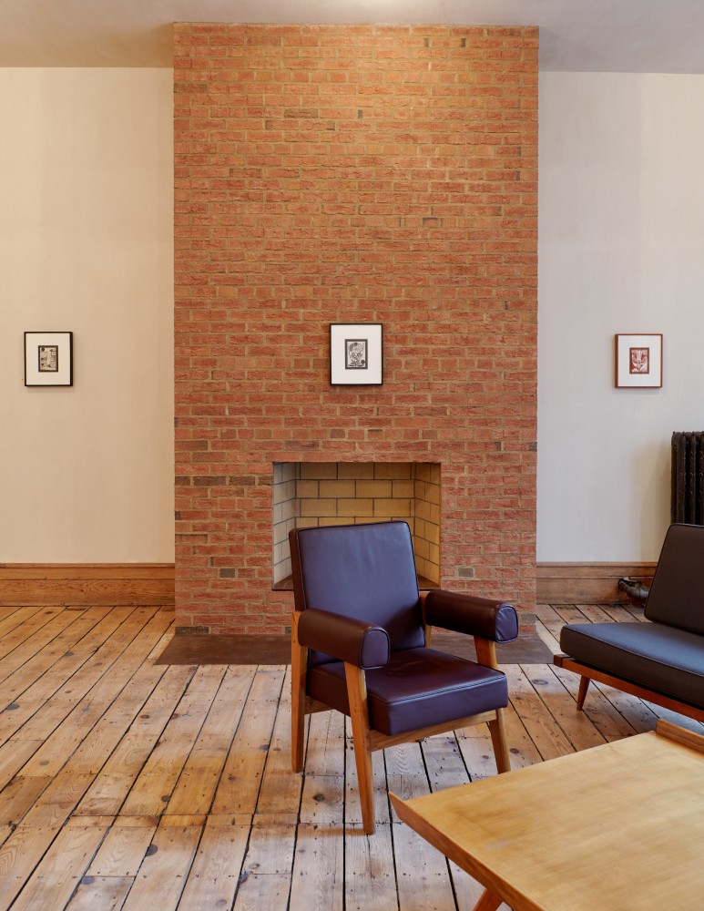 Installation view of paintings and drawings by Austin Eddy