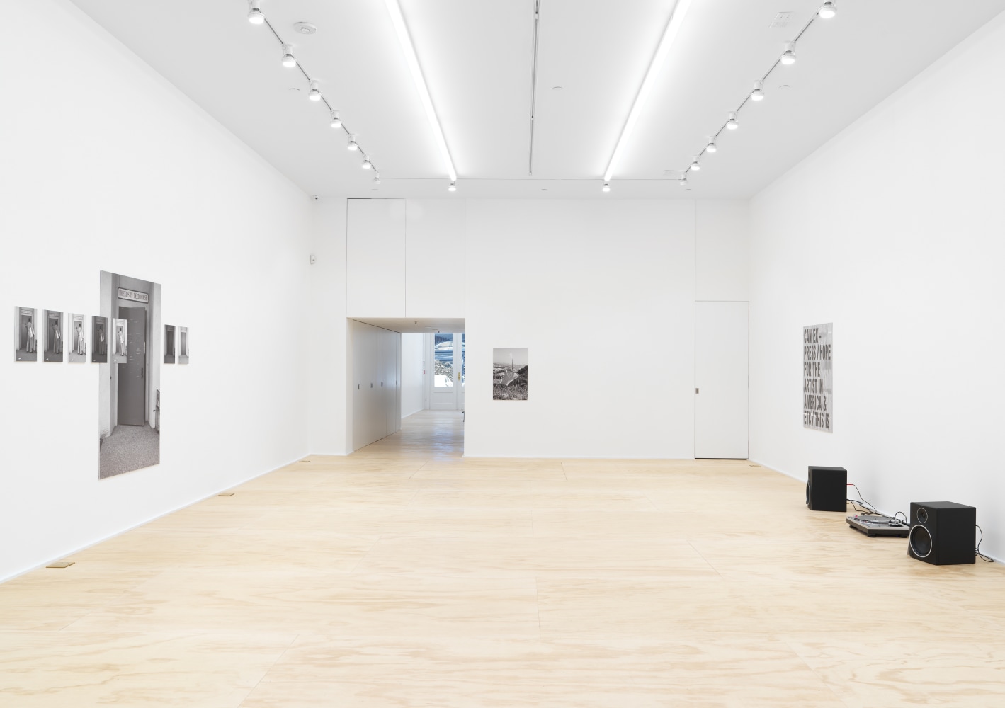 Installation view of photographs by Shannon Ebner