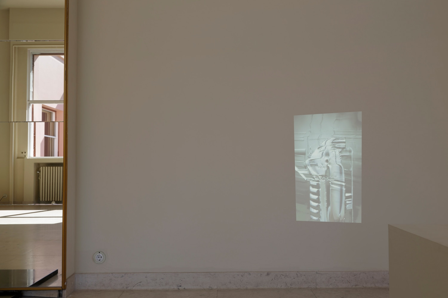 Installation view of videos by Trisha Donnelly