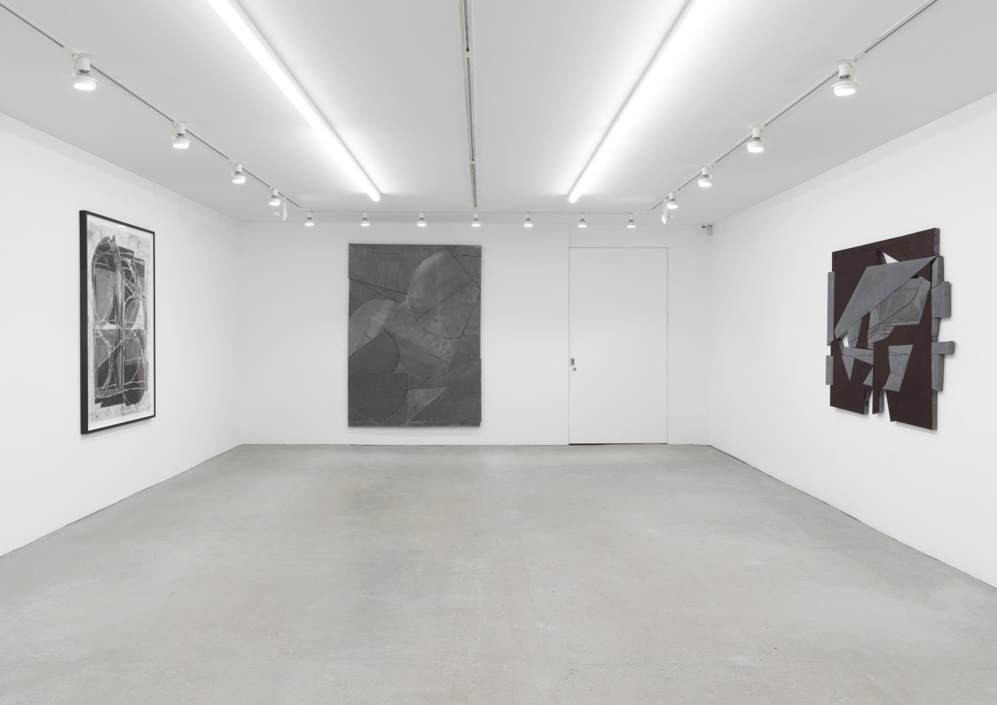 Installation view of Wyatt Kahn wall reliefs and works on paper