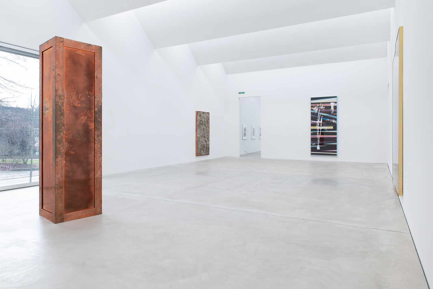 Installation view of sculptures and wall works by Walead Beshty