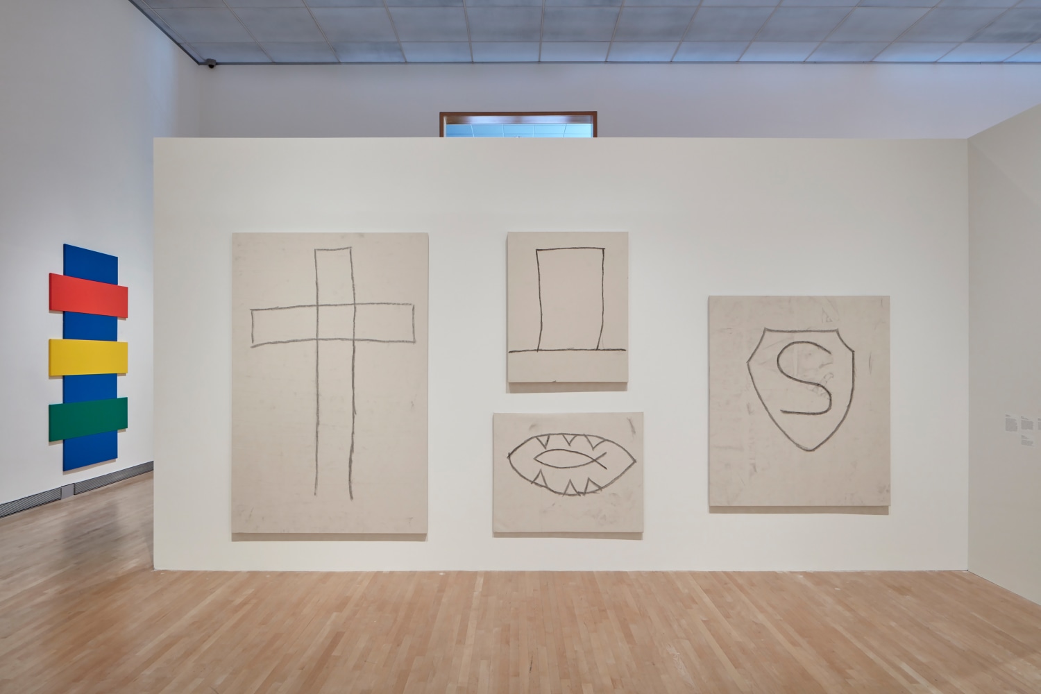 Installation view of paintings and sculptures by Joe Bradley