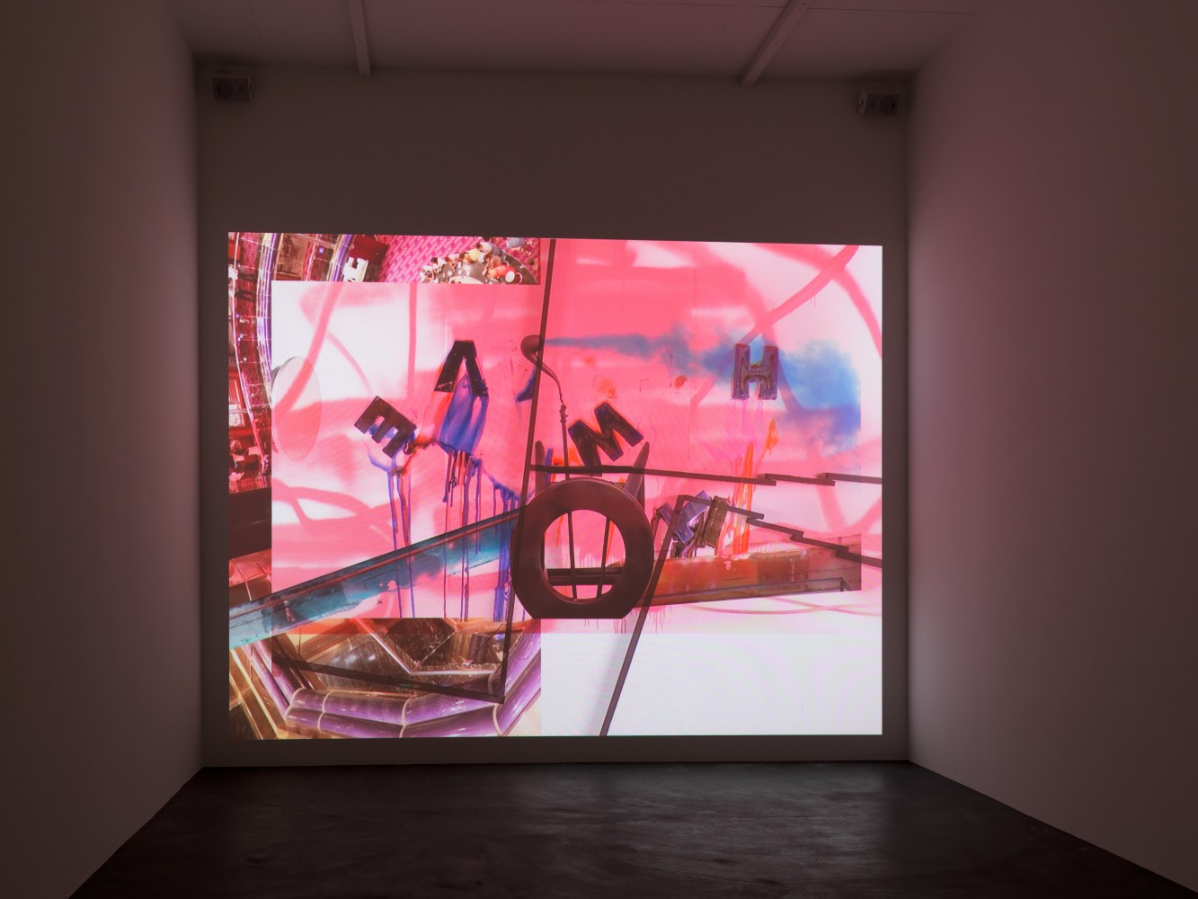 Installation view of projected film and projector by Alex Hubbard
