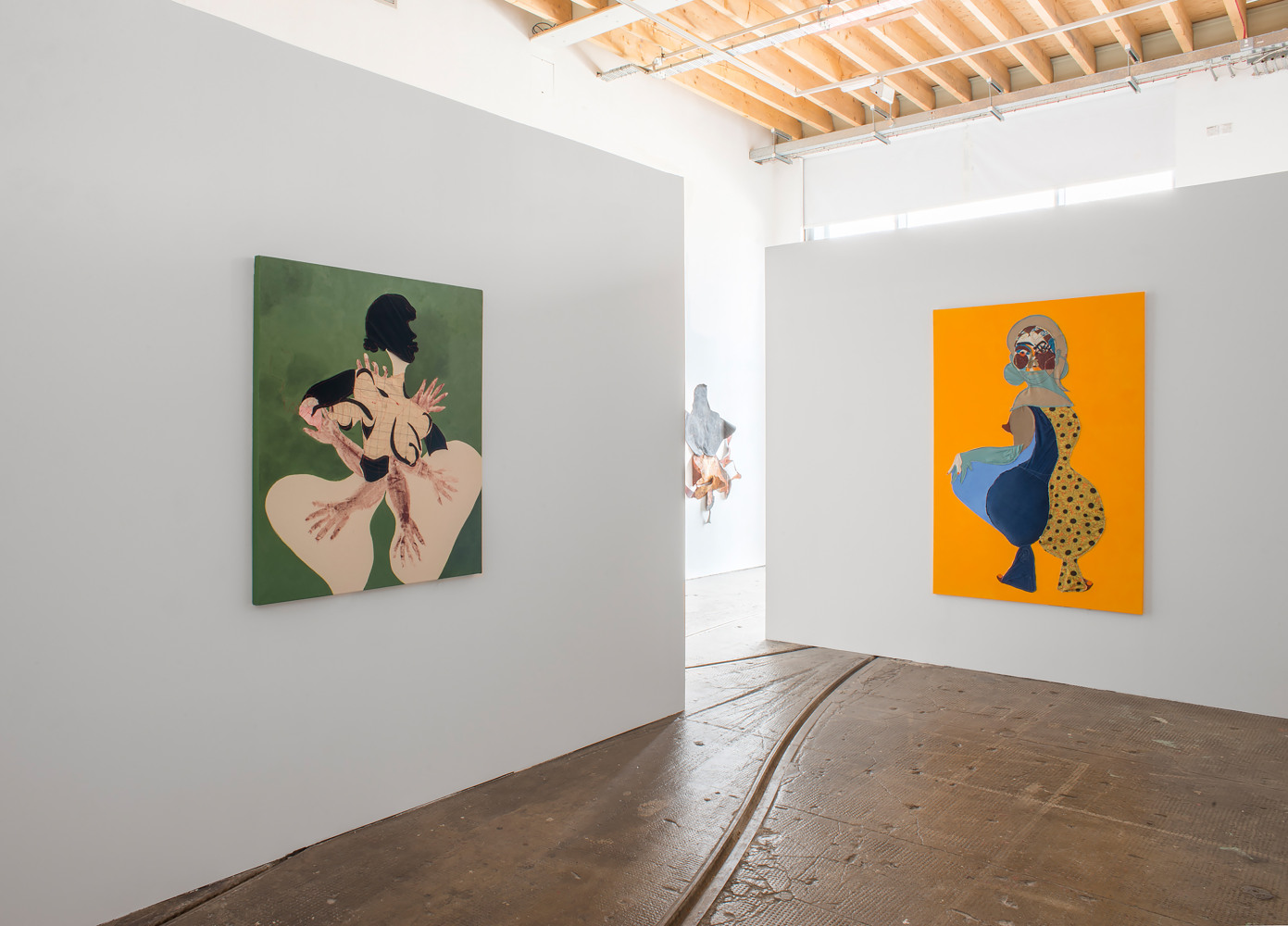 Installation view of paintings by Tschabalala Self