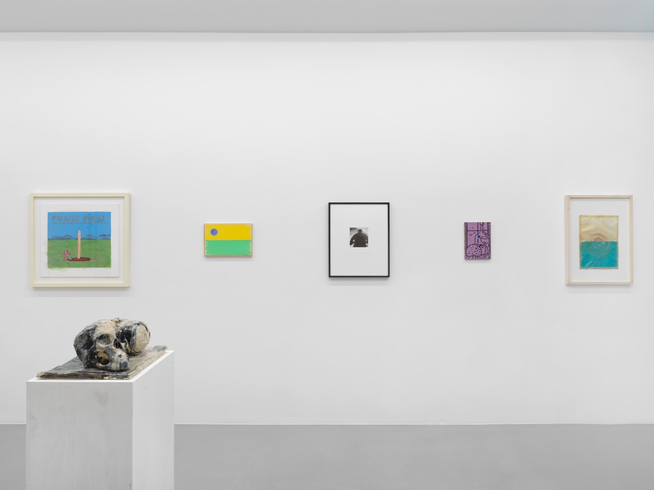 Installation view of group painting, photography, and sculpture exhibition