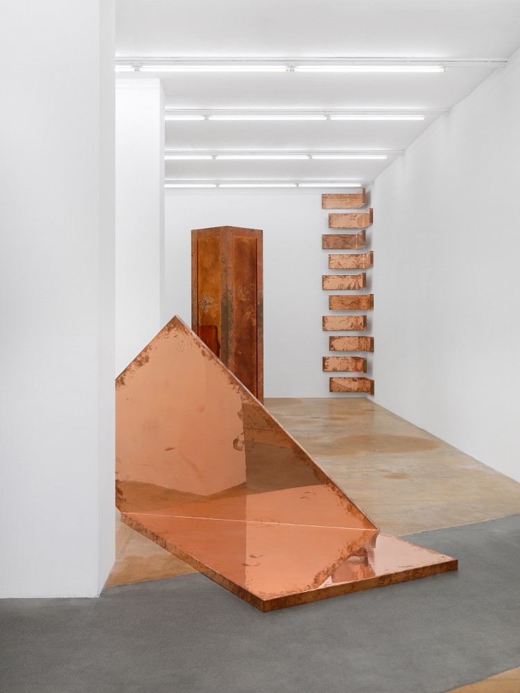 Installation view of sculptures and wall works by Walead Beshty