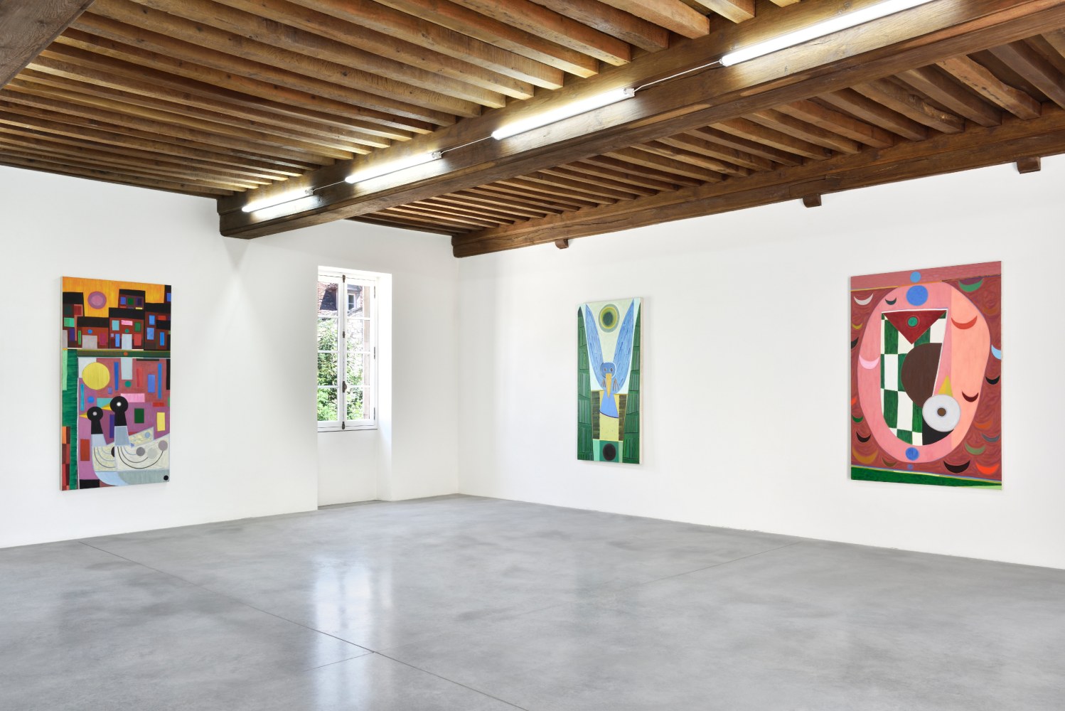 Installation view of paintings and sculptures by Austin Eddy