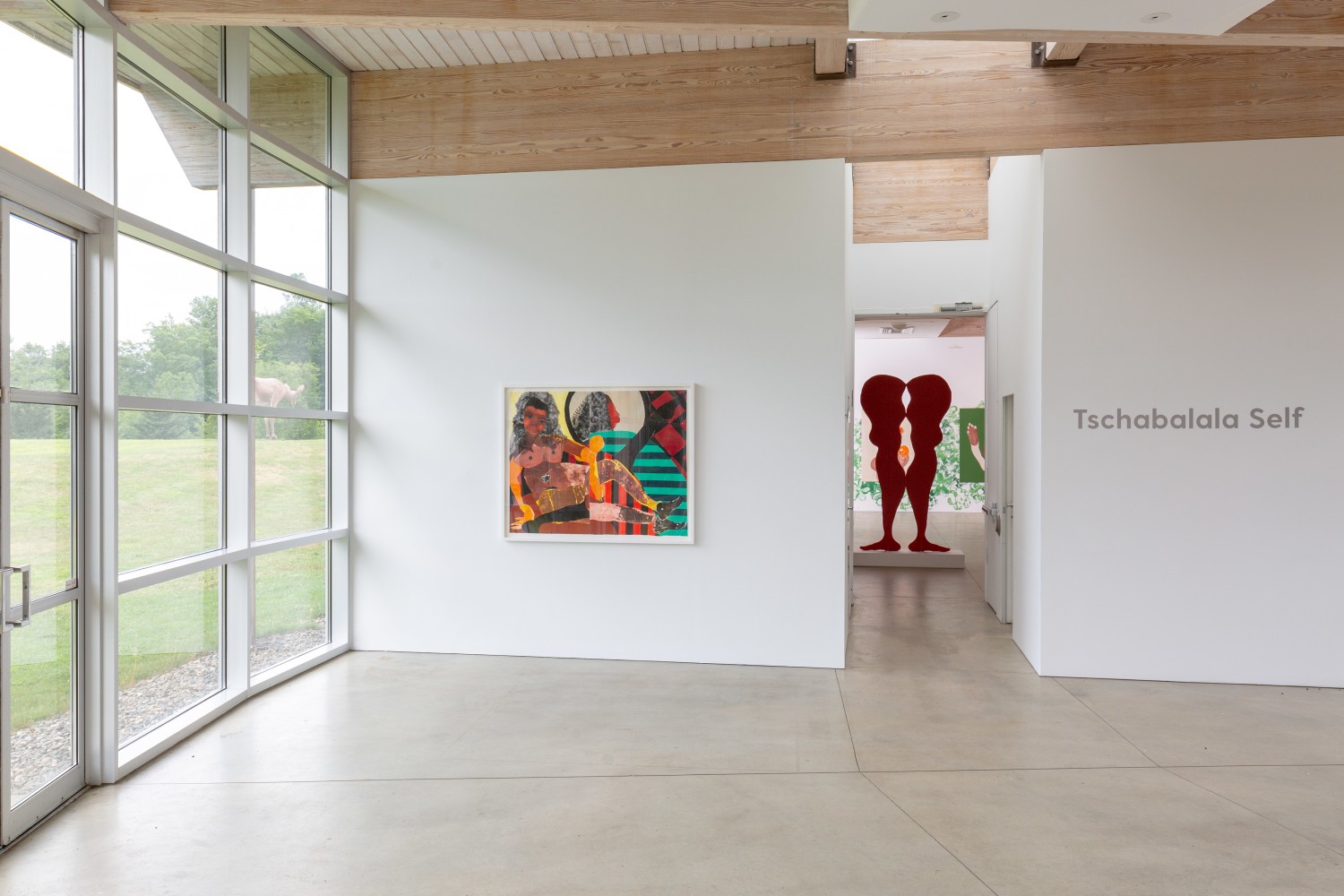 Installation view of paintings and sculptures by Tschabalala Self