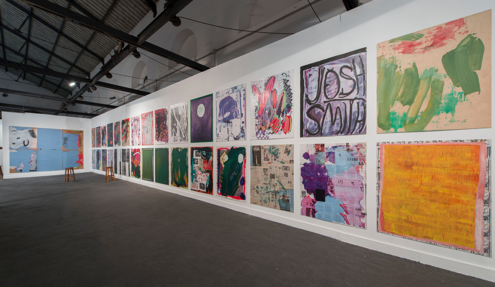 Installation view of paintings by Josh Smith