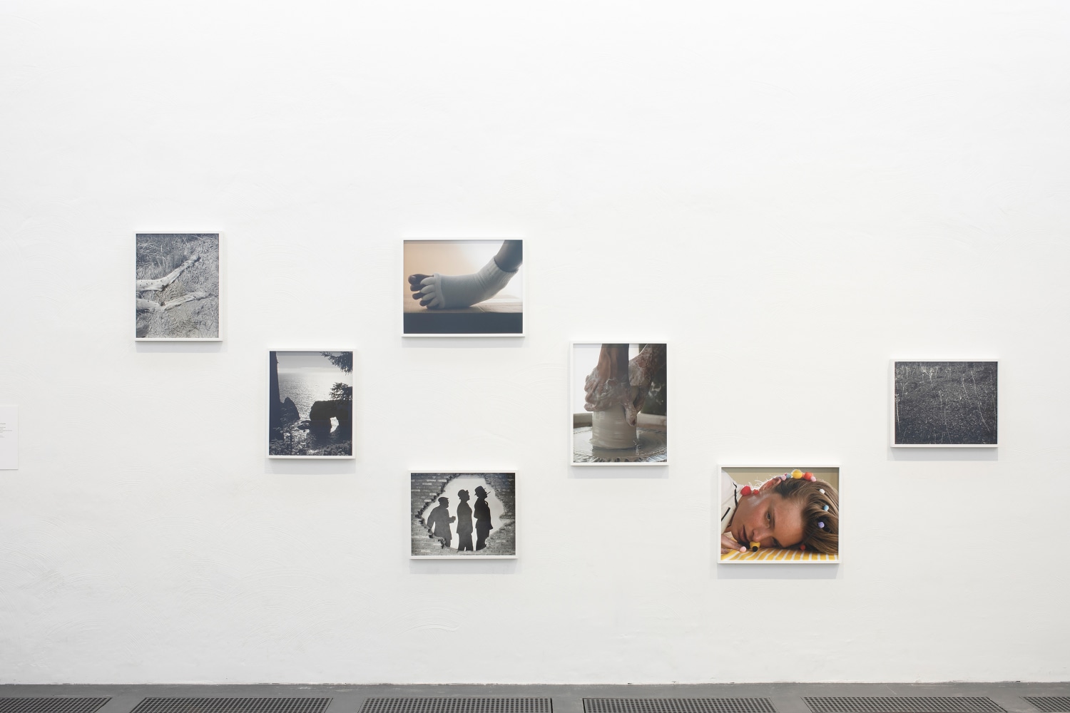 Installation view of photographs by Torbjørn Rødland