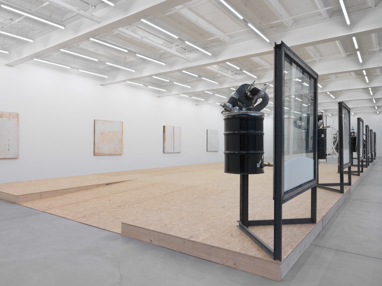 Installation view of Oscar Tuazon sculptures and floor installation exhibition