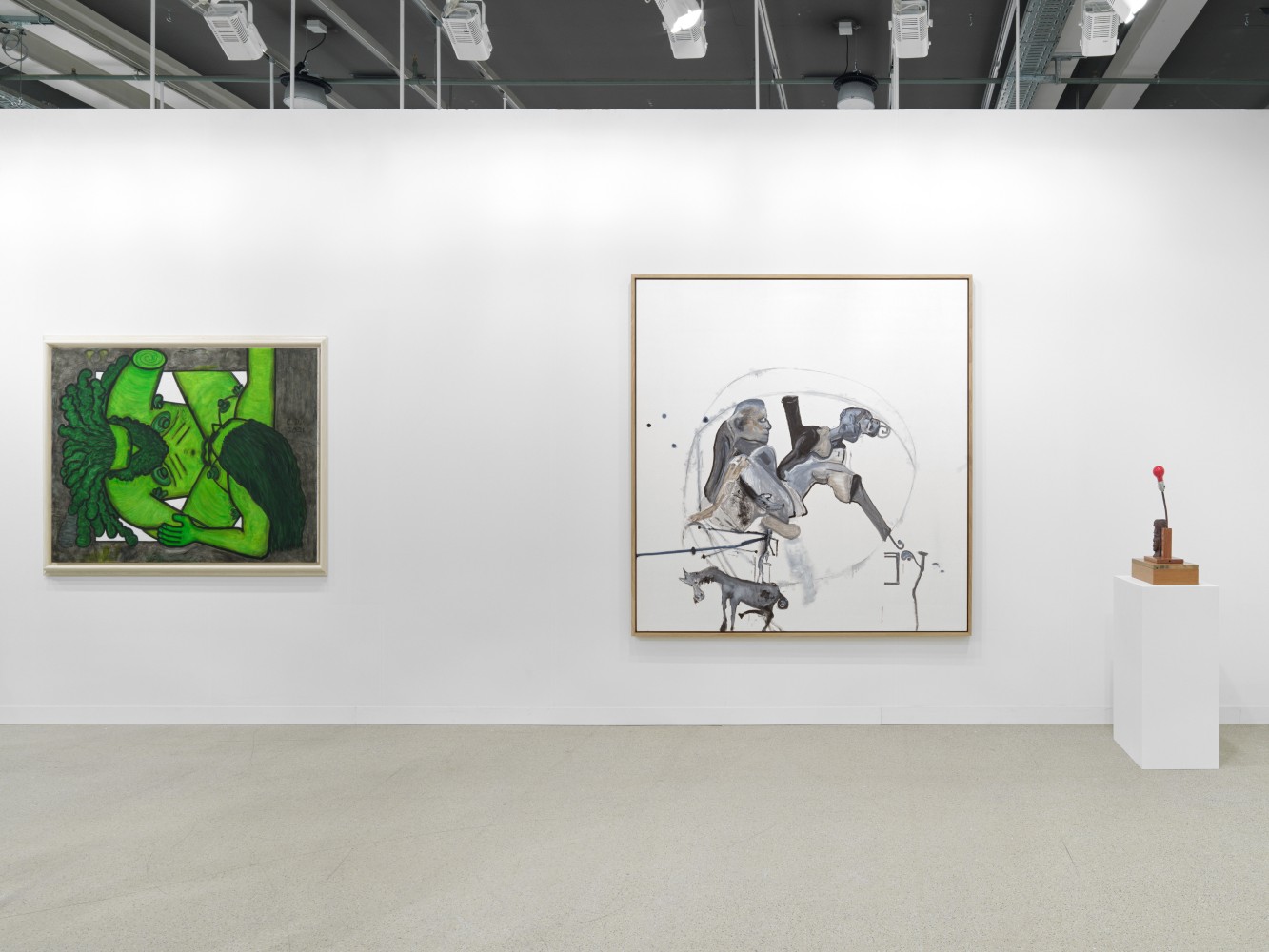 installation view of paintings and sculptures by various artists