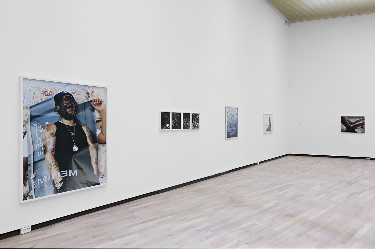 Installation view of photographs by Torbjørn Rødland